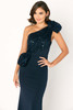 Shimmering sequins wrap the neckline with sculpted texture and oversized knots