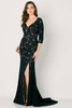 Black lace gown with detachable sleeves, deep V-neckline, and front slit for drama