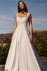 Timeless romance meets nature in this embroidered square-neck A-line gown