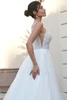 Side view of 7906 wedding dress showing sheer bodice and cutout detail
