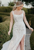 Front view of 7941 floral lace dress with scoop neckline and leg slit