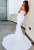 Back view of 7956 dress with low illusion corset and train