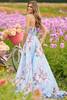 Back view of 56234 prom dress in discontinued blue floral print with strapless bodice