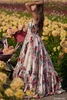 Side view of 56285 prom dress with floral print and full satin skirt