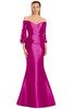 Bold fuchsia colorway featuring off-shoulder neckline with statement ruffle sleeve details.
