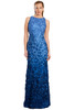 Blue ombré gown with textured floral appliqué and soft sparkle at the neckline