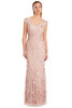 Soft blush gown with delicate floral appliqué and elegant cap sleeves