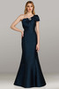 Teal version of style 12458 featuring rhinestone-accented bow and clean pleated seam work
