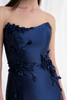 Close-up of the strapless neckline and floral appliqués on Morilee 73155