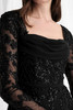 Close-up of draped square neckline and beaded illusion sleeves on Morilee 73185
