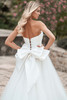 Allure Bridals A1311 close-up—structured bodice with lace-up back and statement bow.