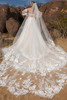 Kitty Chen Acacia full back view with detachable train spread across the ground