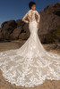 Back view of Kitty Chen Natalia gown featuring lace illusion back and covered buttons