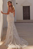 Back view of Faviana by Madison James with low back and chapel-length lace train.