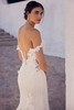 Close-up of Sophia Tolli Y3194  showing the illusion back with button closure, and lace appliqués