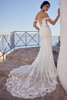 Back view of Sophia Tolli Y3194 showcasing the illusion back with covered buttons