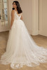 Back view of the Portrait by Enzoani Omarra gown featuring supportive high lace back and layered tulle skirt.