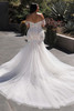 Back view of the Portrait by Enzoani Margaux gown featuring high back support and flared tulle skirt.
