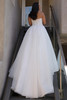 Back view of the Portrait by Enzoani Genevieve gown featuring drop waist and full dramatic tulle skirt.