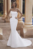 Bride wearing Udelia without overskirt showing sleek mermaid silhouette.