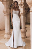 Slim silhouette of Enzoani Viola gown without overskirt, featuring leg slit.