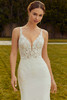 Bride in Raquel showcasing illusion lace straps and detailed embroidery.