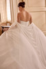 Justin Alexander Leti wedding dress back view featuring a smooth crepe skirt and flowing chapel-length train.