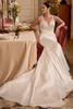Justin Alexander Laine mikado wedding gown side view with asymmetric waist and flowing chapel train.