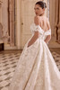 Justin Alexander Lisette ball gown wedding dress side view highlighting structured bodice and layered organza skirt.