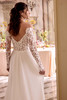 Justin Alexander Leila A-line wedding gown side view highlighting sheer bodice and soft chiffon movement.