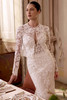 Justin Alexander Liza wedding dress close-up showing sequined lace detail and illusion bodice construction.