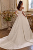 Justin Alexander Larissa wedding dress back view featuring basque waist and flowing chapel-length train.