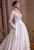 Justin Alexander Lisbeth A-line wedding dress side view highlighting plunging neckline and airy tulle sleeve detail.