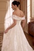 Justin Alexander Lily ball gown wedding dress side view highlighting textured jacquard fabric and full skirt.