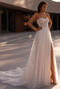 Demetrios Style 1511 A-line wedding dress with strapless sweetheart neckline, paillette beaded tulle, and flowing skirt.