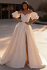 Demetrios Style 1520 A-line wedding dress with beaded ruched bodice, statement sleeves, and flowing Mikado skirt.