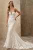 Demetrios Style 1538 flared wedding dress with sweetheart neckline, illusion plunge, and richly textured beaded lace.