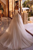Demetrios 8280 A-line featuring lace underlay and flowing chapel train, back view