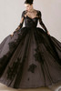 Morilee Chasse black gown front view with floral appliqué and A-line silhouette