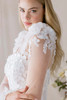 Morilee Alina close-up of 3D floral appliqué on lace bodice