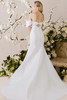 Morilee Rayn wedding dress featuring bow keyhole back and button detail down the hemline