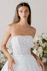 Morilee Pirouette wedding gown front detail with hand-beaded lace bodice and strapless neckline