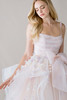 Morilee Huda wedding gown three quarter view in blush multi with draped bodice and soft waist bow