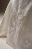 Maggie Sottero Radiance wedding gown fabric detail subtle floral pattern on Mikado