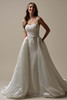 Maggie Sottero Star wedding gown front view with detachable organza overskirt and bow belt