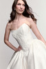 Watters Locket Fern wedding gown close-up with floral appliqués and drop waist detail