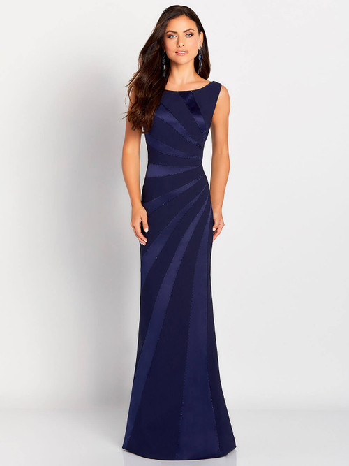 Navy column gown with tonal satin stripes and subtle beaded swirl accents Navy column gown with tonal satin stripes and subtle beaded swirl accents