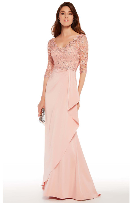 Scalloped lace bodice and ruched overlay skirt bring elegance to this blush gown.