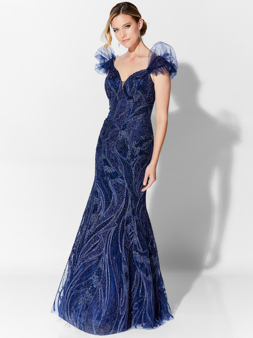 Off-the-shoulder elegance meets shimmering navy detail in this sculpted beaded gown