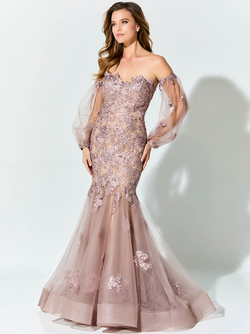 Blush lace embroidery and detachable tulle sleeves elevate this romantic trumpet gown Blush lace embroidery and detachable tulle sleeves elevate this romantic trumpet gown